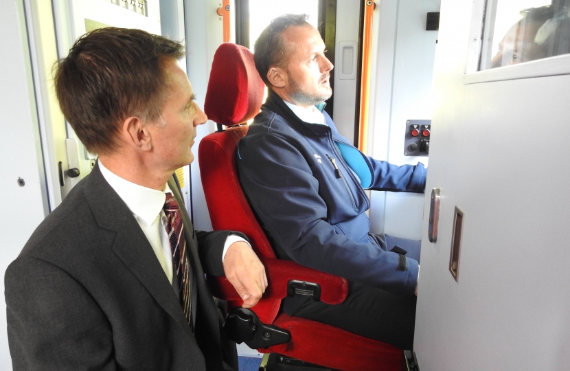 Jeremy Hunt MP in the front of the cab with SWR train driver Phil Cox