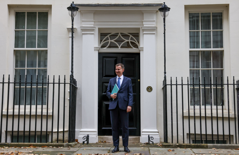 Chancellor Jeremy Hunt leaves Downing Street to deliver Autumn Statement 2023.