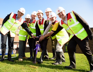 Jeremy Hunt MP pictured (centre) cutting the turf