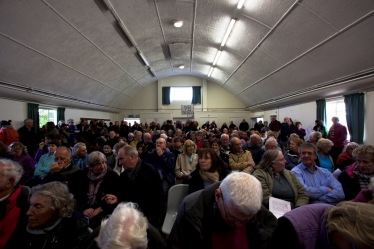 The packed public meeting